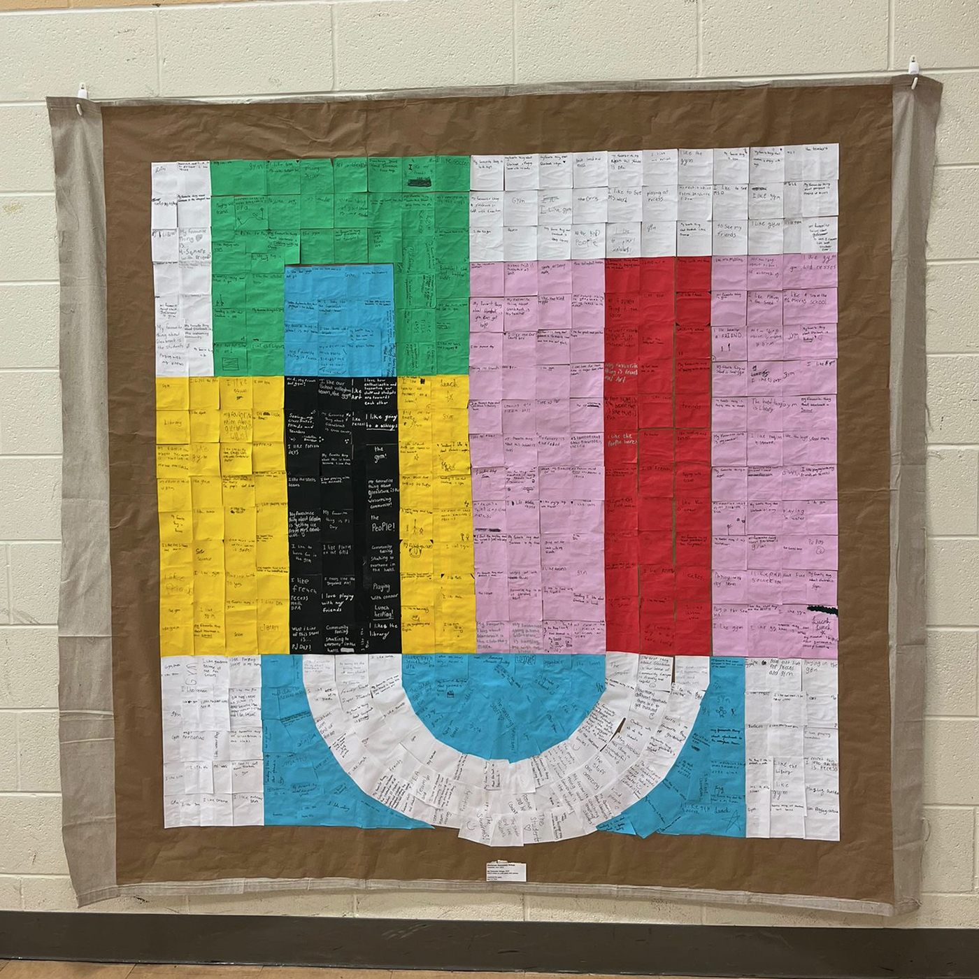 The Upper Grand logo, depicted in colourful sticky notes.