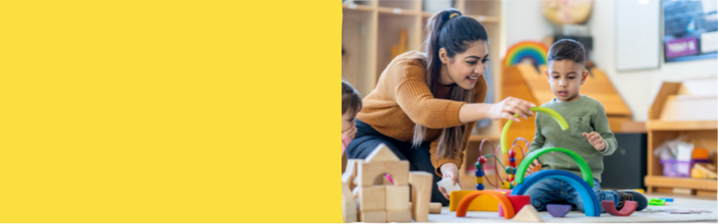 A yellow graphic that has a picture of a kindergarten educator and a kindergarten aged student playing