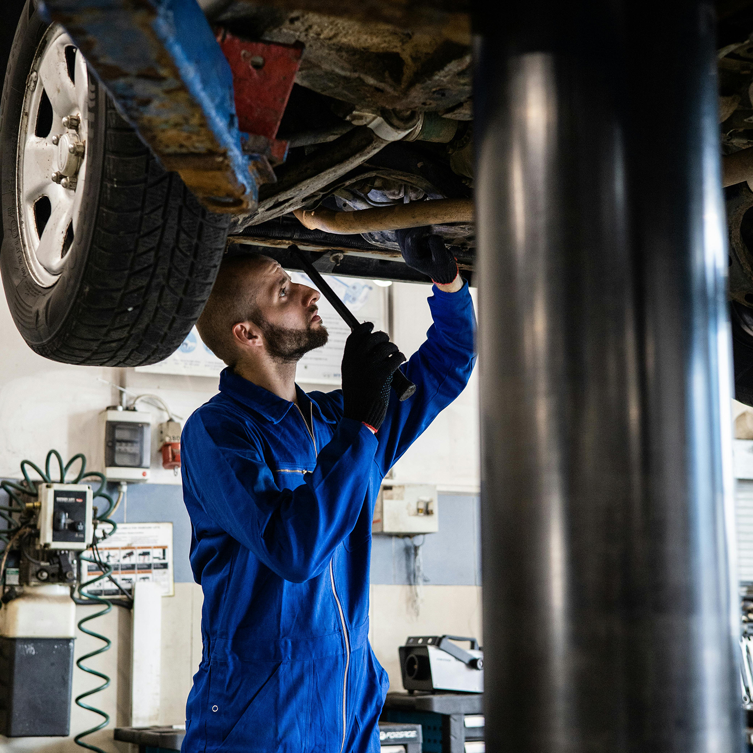 mechanic working on a car