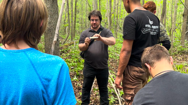 An educator teaching about Foraging for a SHSM Certification