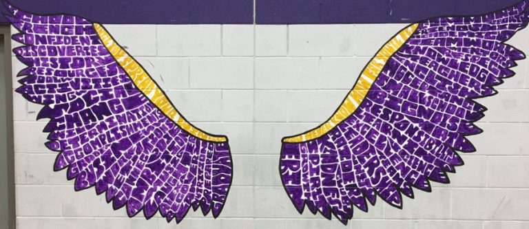 wings painted in a wall