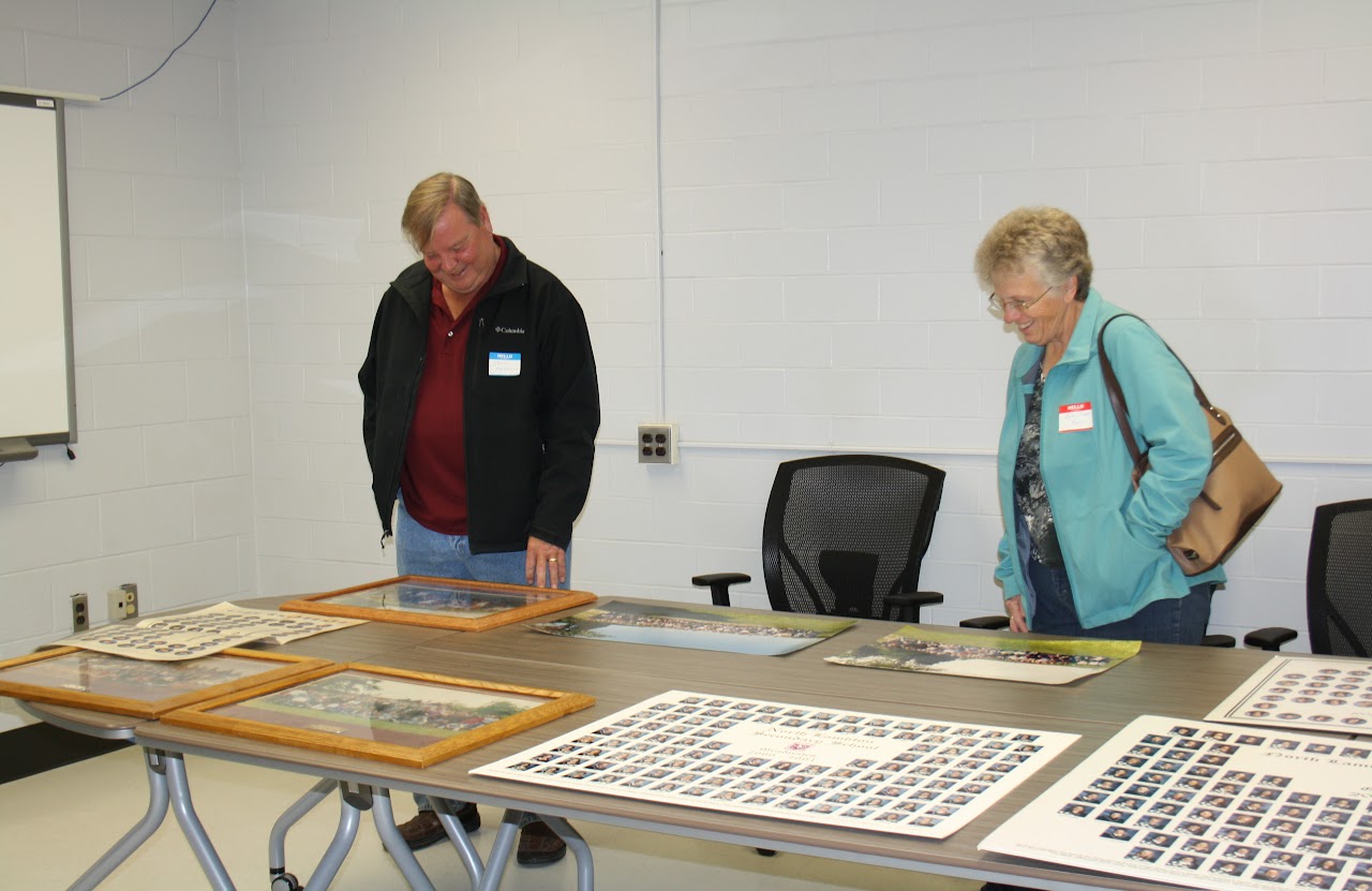 staff members checking out papers