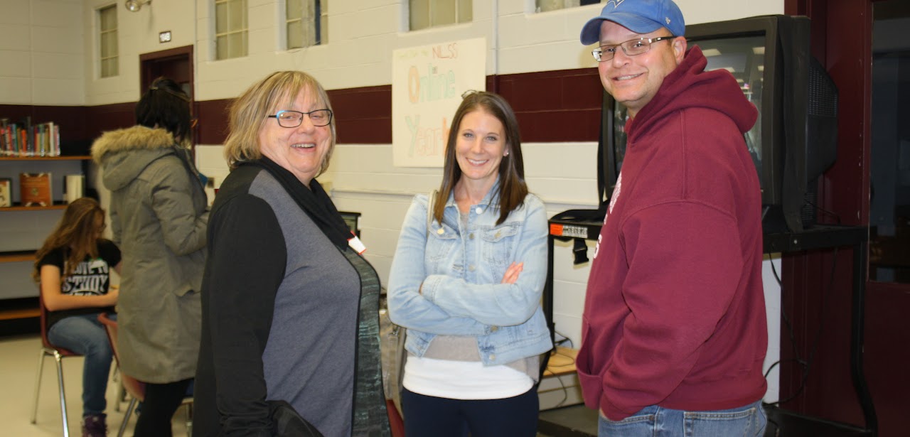 3 people smiling at the camera