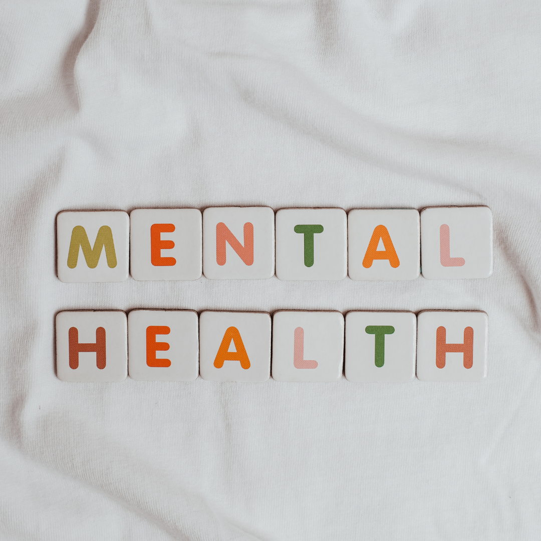 Alphabet tiles  spelling out mental health