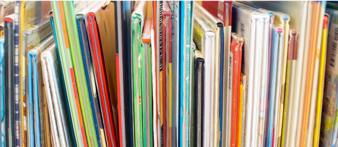 Books stacked on a shelf