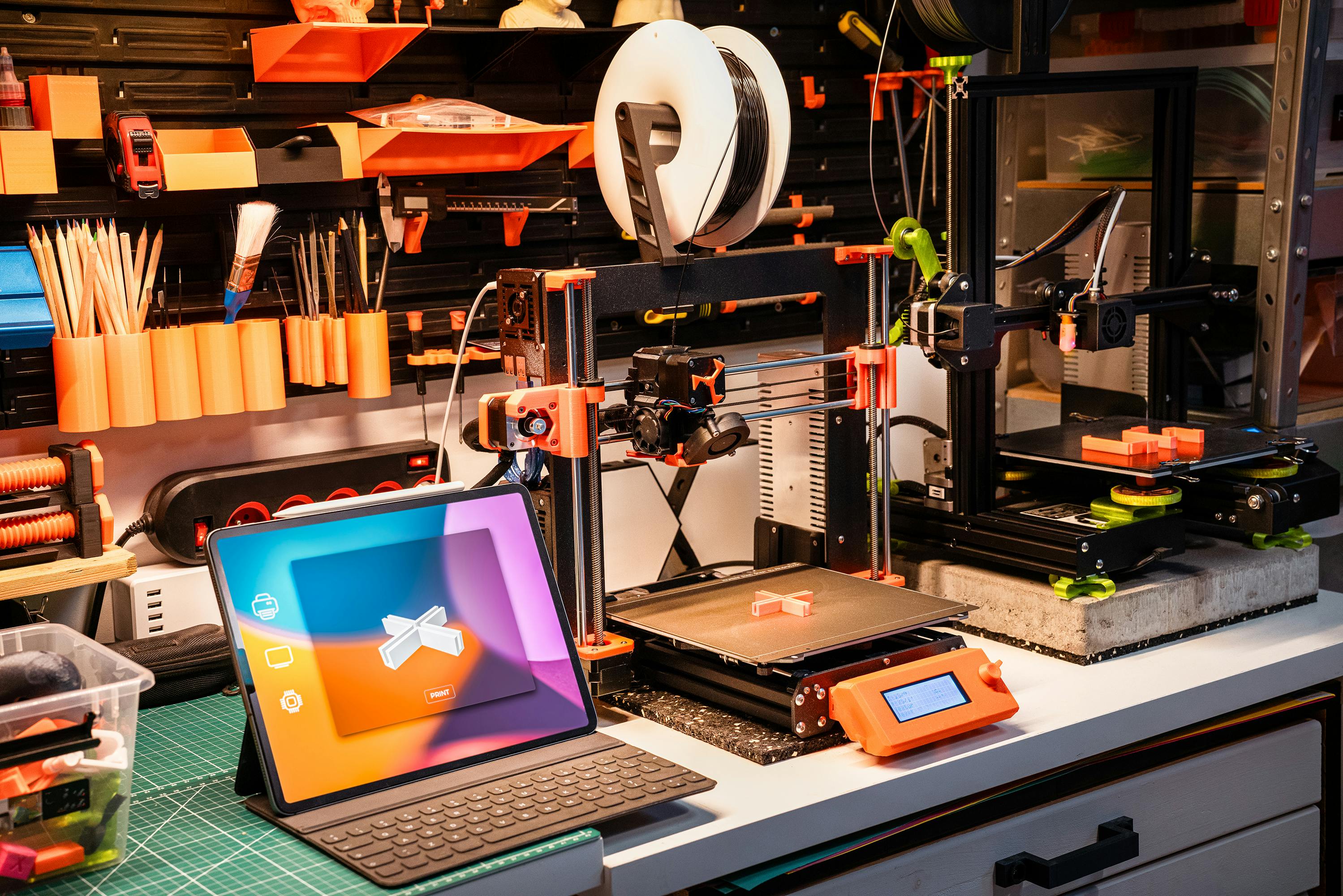 A makerspace set up with a computer and 3D printer