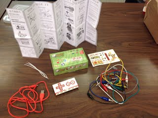 Makey Makey kit pieces on a desk