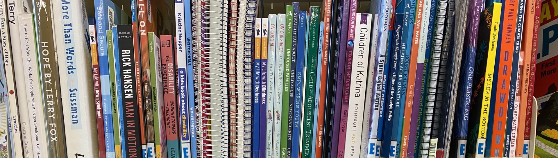Shelf of colourful teacher resource books