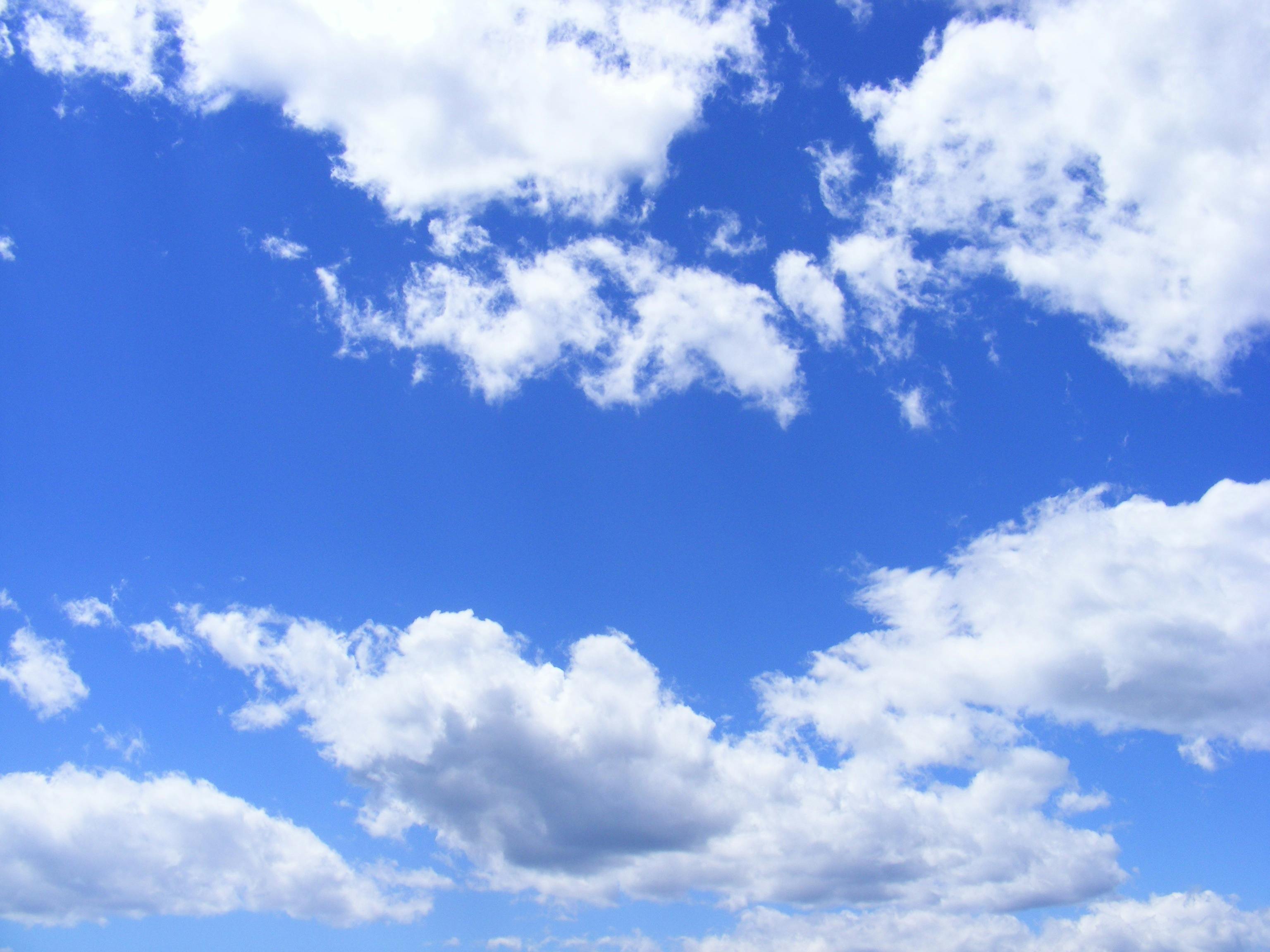 White clouds against a blue sky